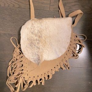 Cowhide crossbody bag.